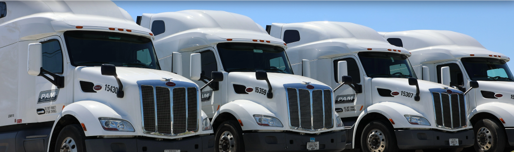 PAM Fleet of new Trucks in a parking lot